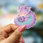 Bookish Vinyl Holographic Sticker - Sleeping baby dragon